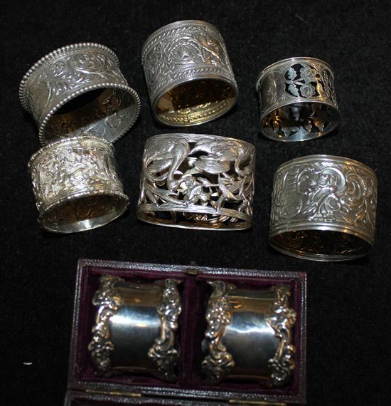 Cased pair of napkin rings and 6 odd napkin rings